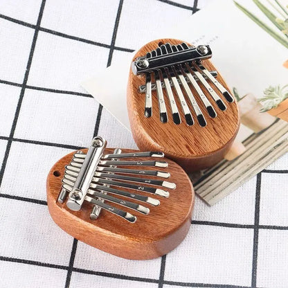 1Pcs Wood Mini Thumb Piano Musical Toys 8 Tones Portable Beginner Finger Piano